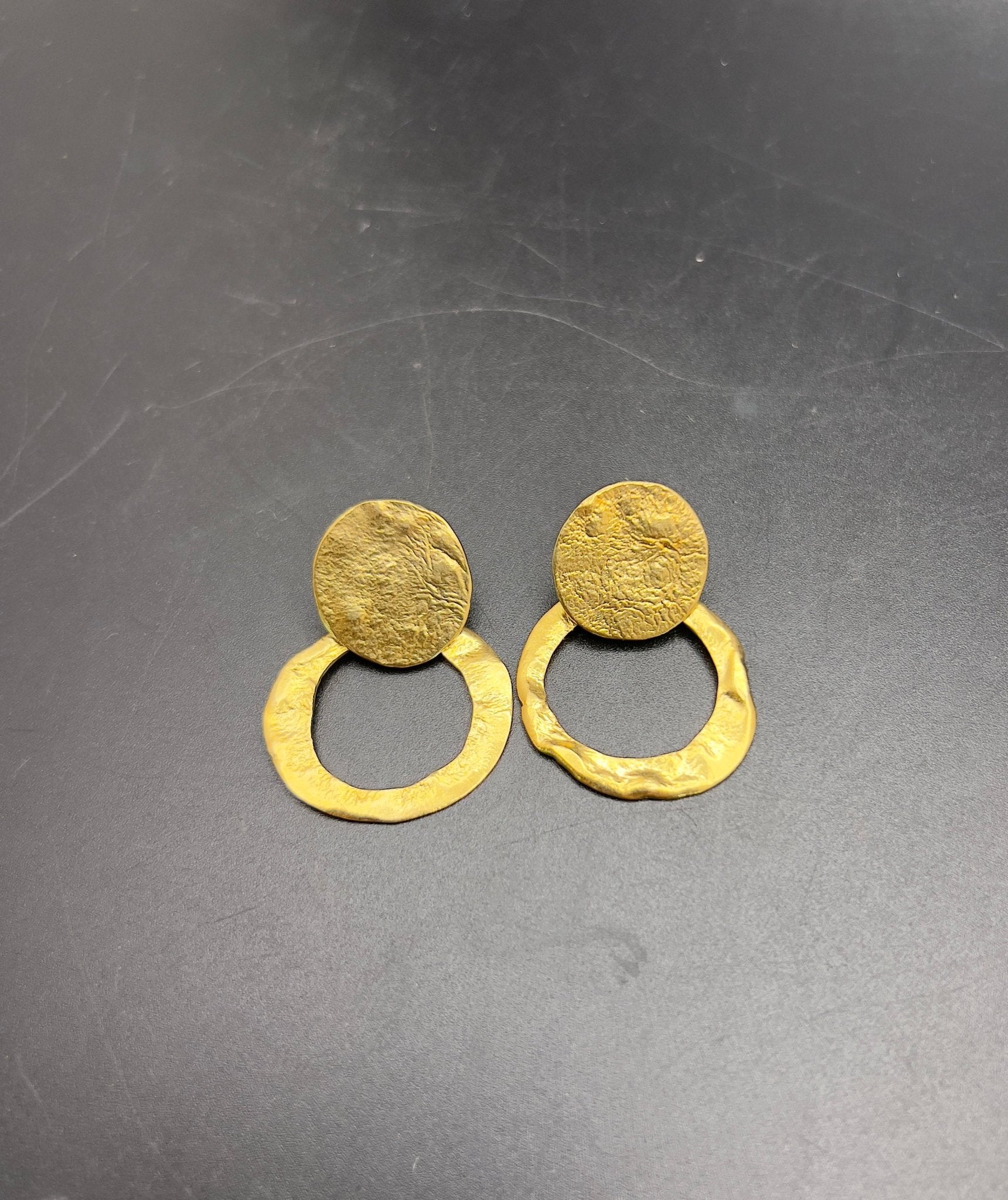 Displaced Sun Earrings in gold