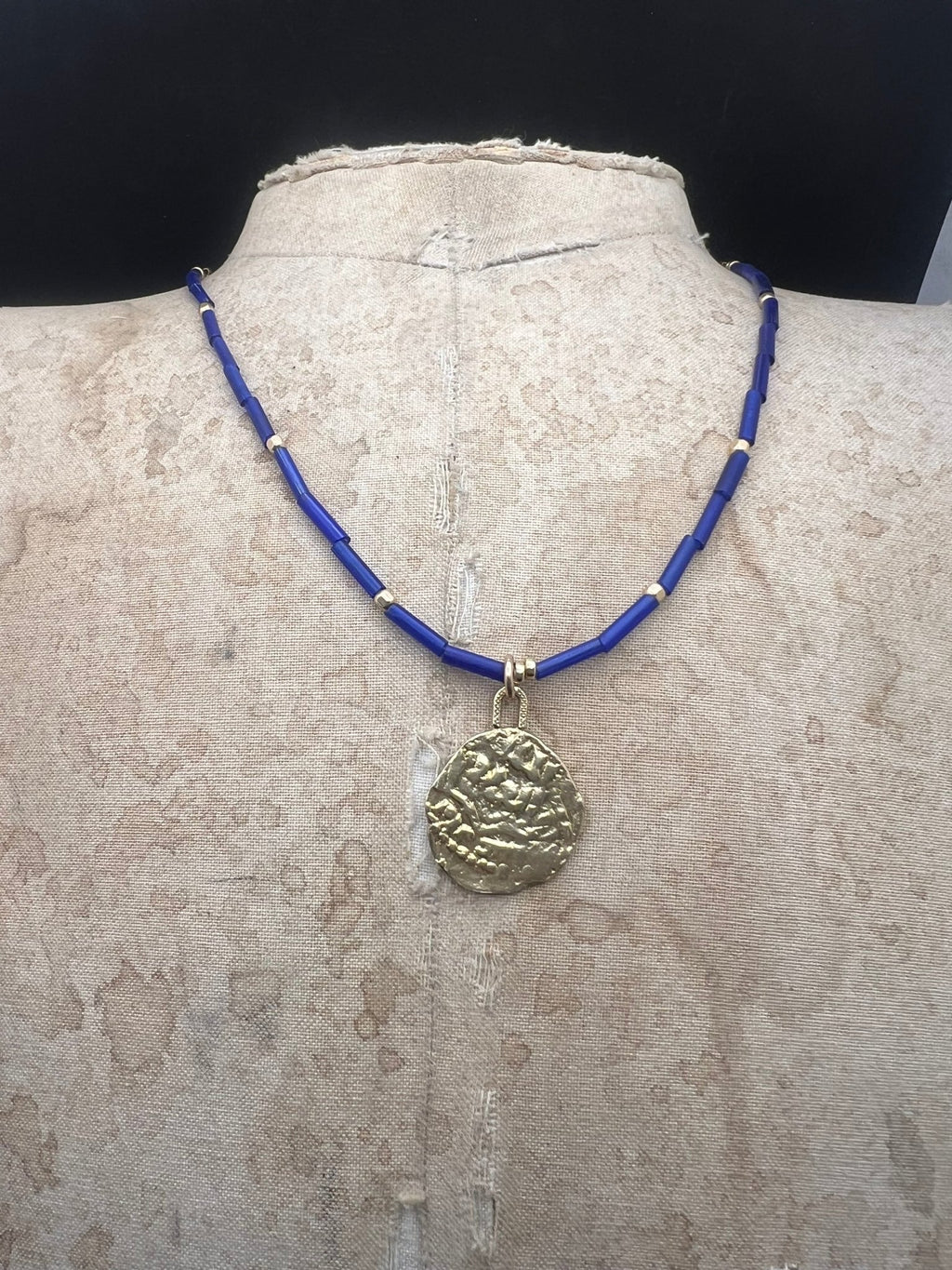 Blue Exile coin necklace