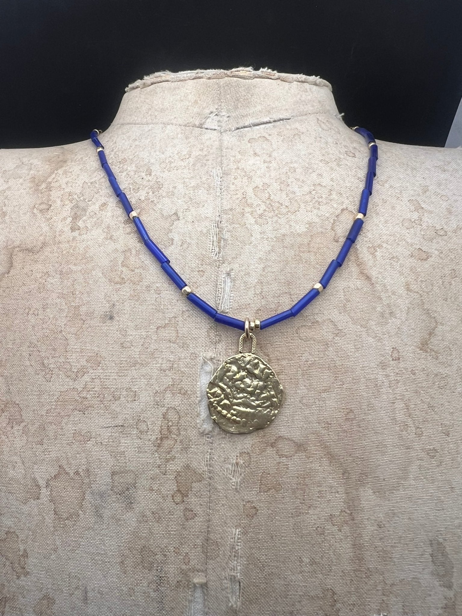 Blue Exile coin necklace