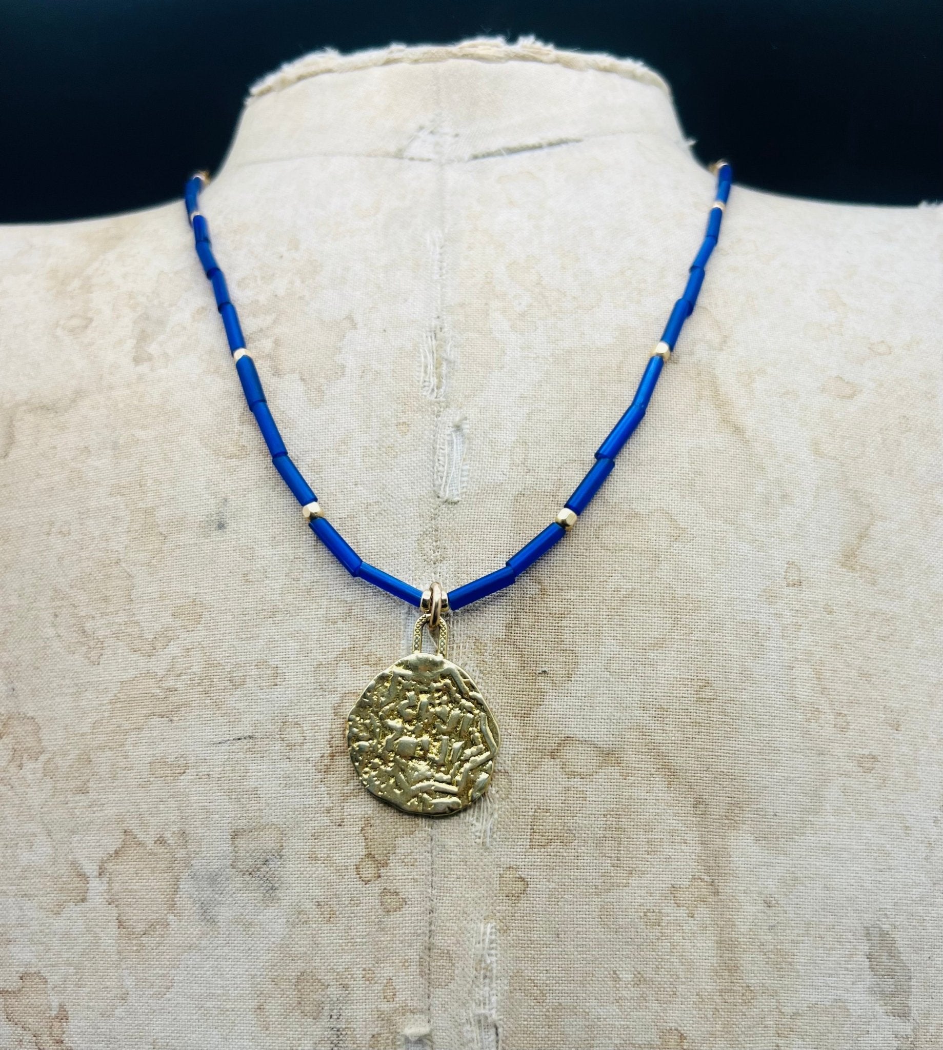 Blue Exile coin necklace