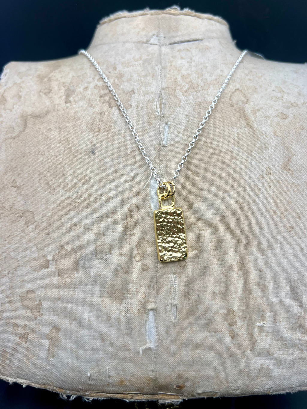 Gold lozenge pendant