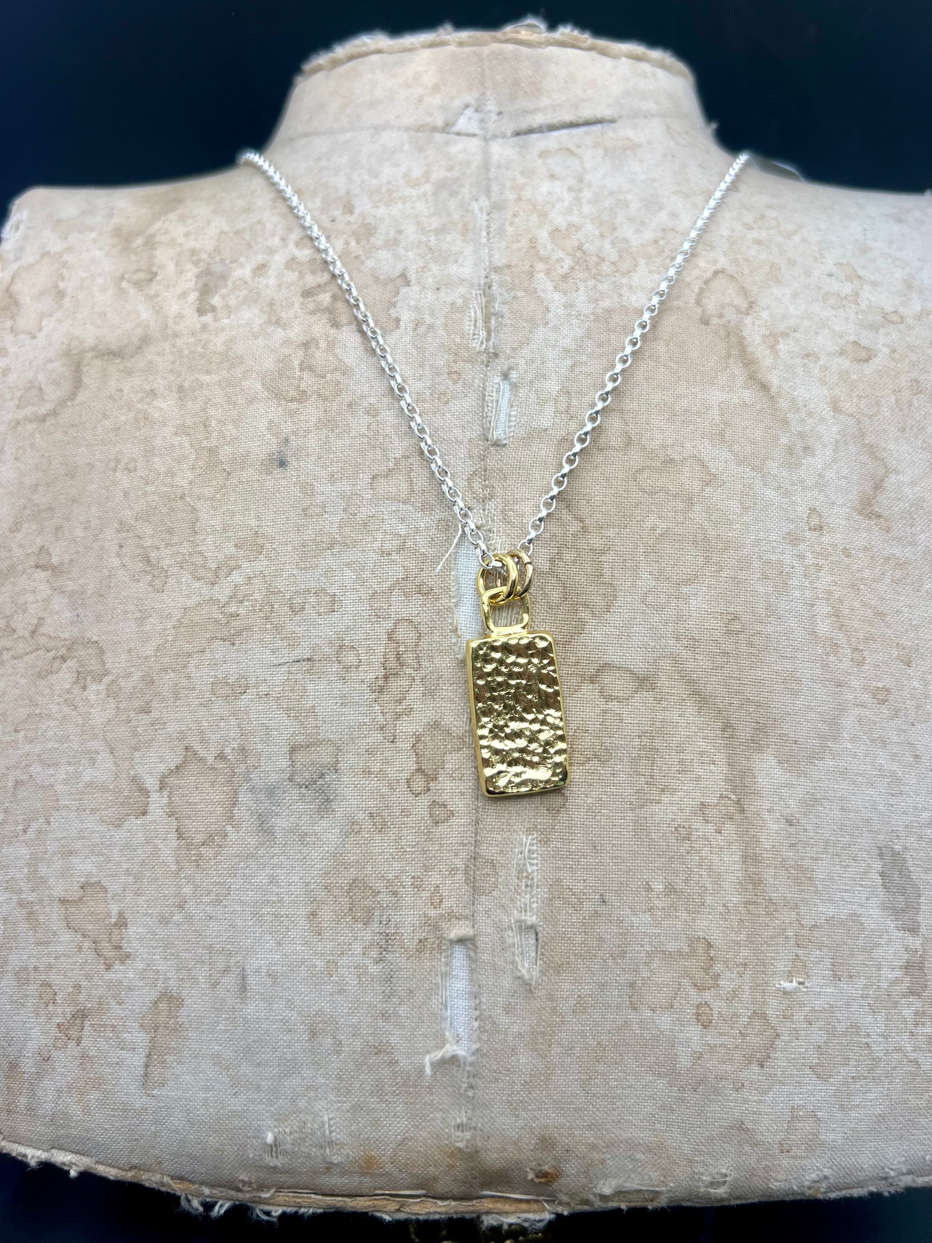 Gold lozenge pendant