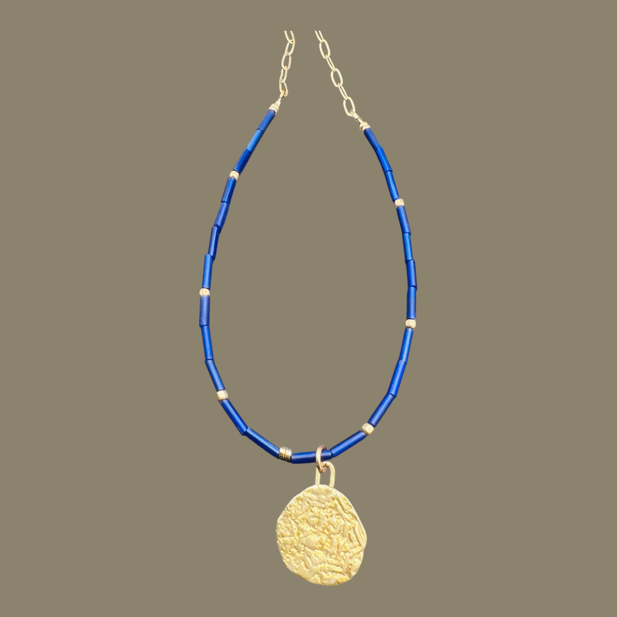 Blue Exile coin necklace