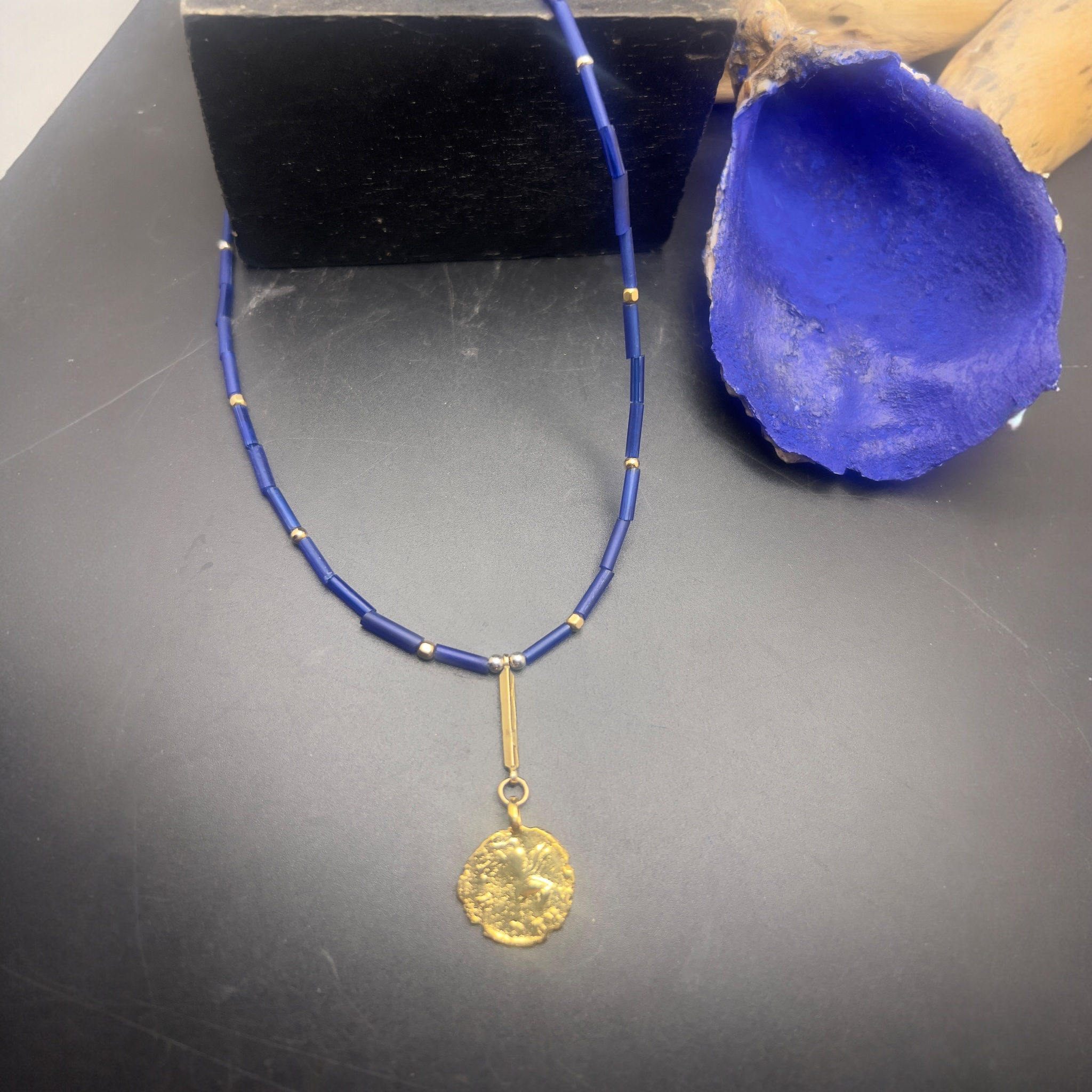 Blue glass Pegasus necklace