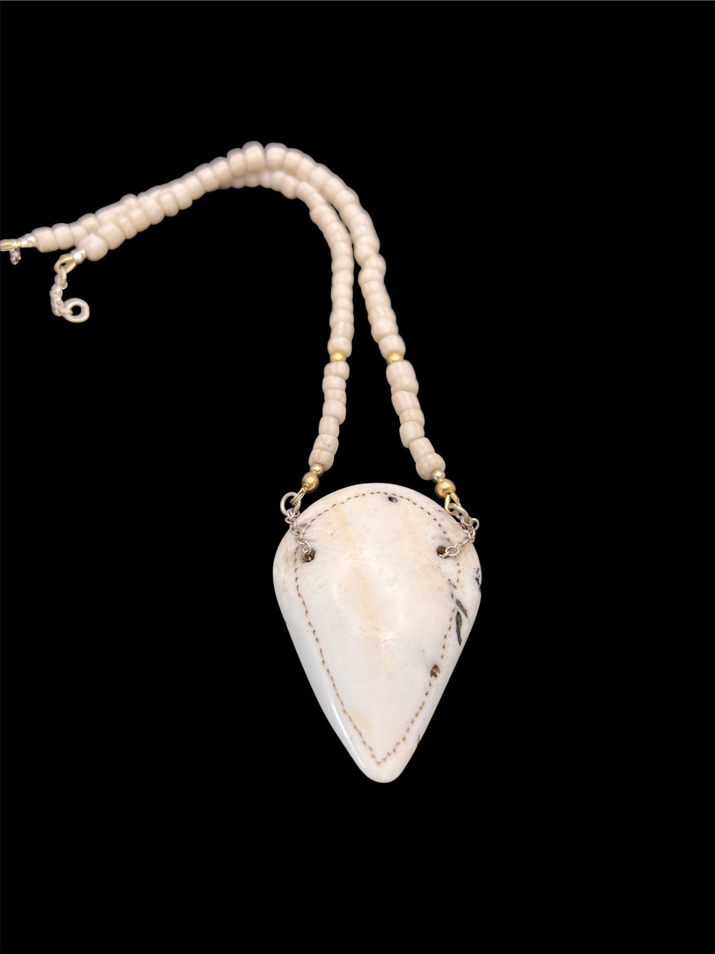 Naga shell pendant