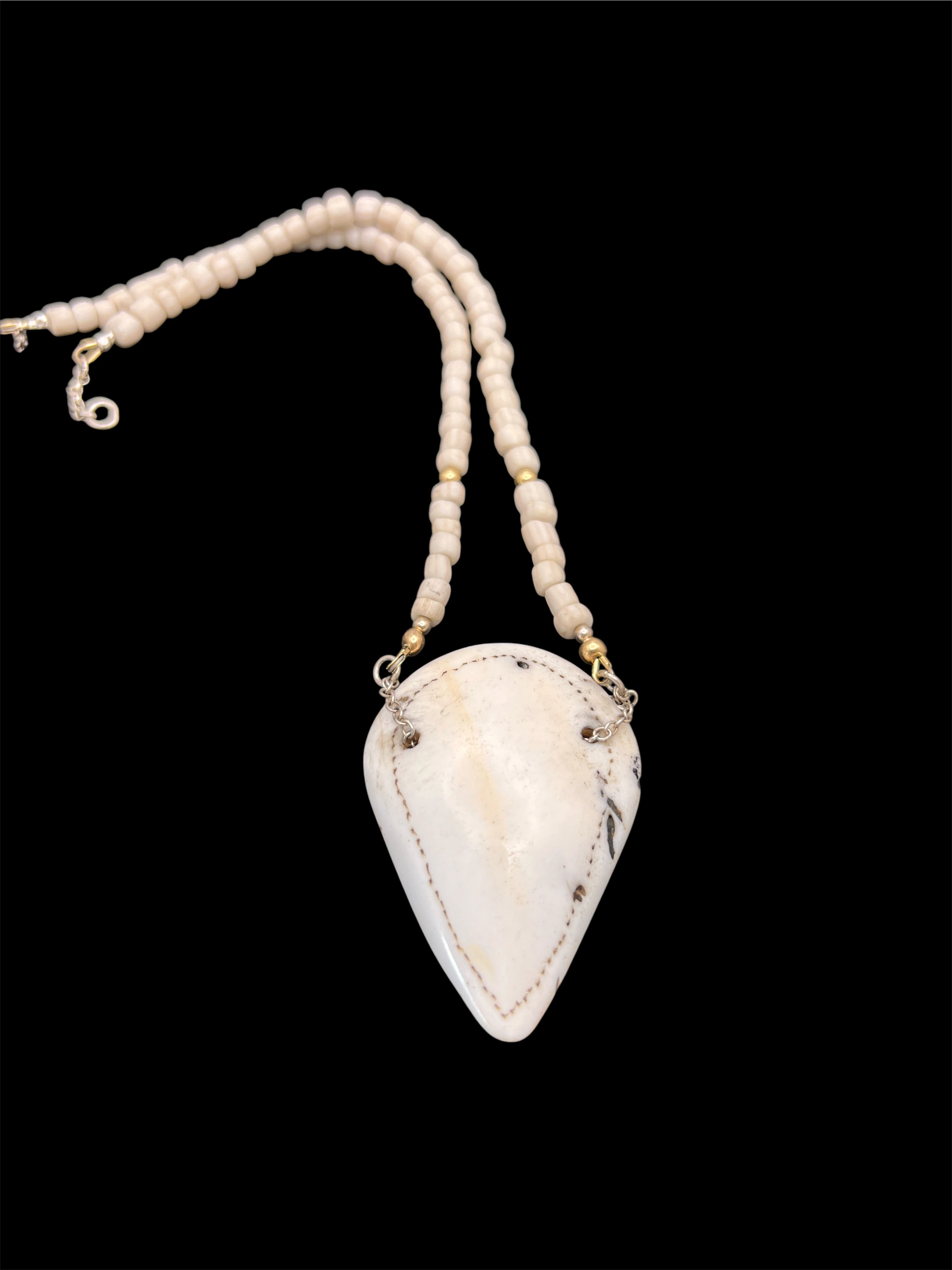 Naga shell pendant