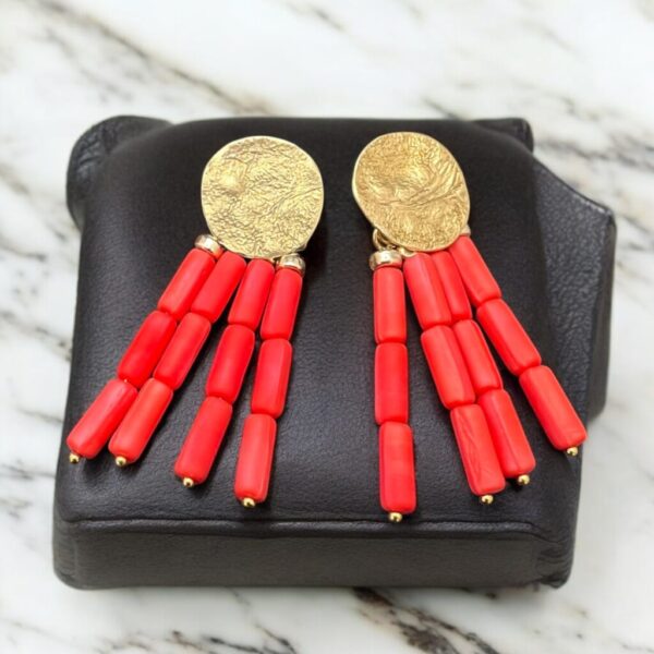 Coral not coral statement earrings.